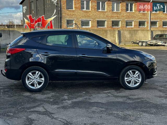 Чорний Хендай іх35, об'ємом двигуна 2 л та пробігом 225 тис. км за 12999 $, фото 3 на Automoto.ua
