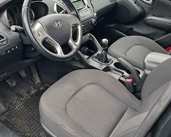 Чорний Хендай іх35, об'ємом двигуна 1.7 л та пробігом 167 тис. км за 10900 $, фото 6 на Automoto.ua