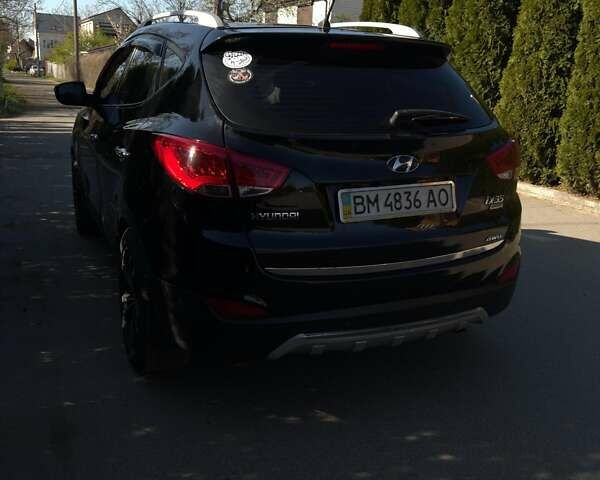 Чорний Хендай іх35, об'ємом двигуна 2.4 л та пробігом 213 тис. км за 12000 $, фото 2 на Automoto.ua