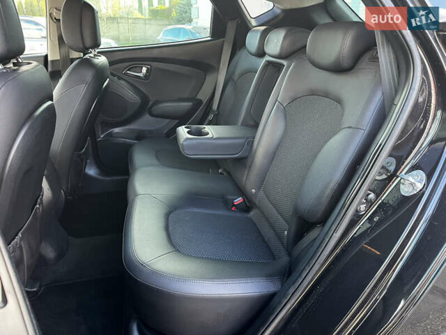 Чорний Хендай іх35, об'ємом двигуна 2 л та пробігом 225 тис. км за 12999 $, фото 30 на Automoto.ua