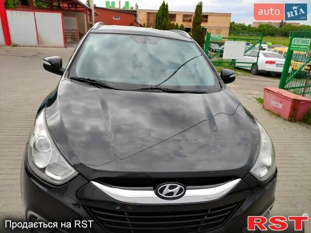 Черный Хендай их35, объемом двигателя 2 л и пробегом 290 тыс. км за 10500 $, фото 3 на Automoto.ua