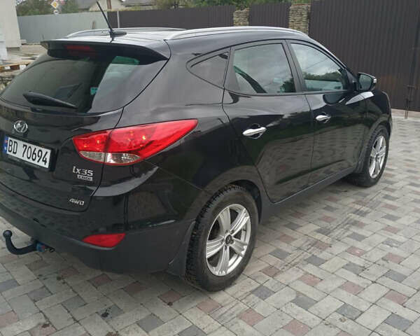 Черный Хендай их35, объемом двигателя 2 л и пробегом 111 тыс. км за 11900 $, фото 4 на Automoto.ua