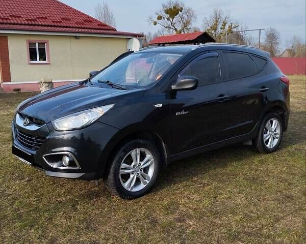 Черный Хендай их35, объемом двигателя 1.69 л и пробегом 250 тыс. км за 11888 $, фото 4 на Automoto.ua