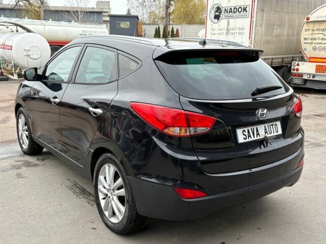 Чорний Хендай іх35, об'ємом двигуна 2 л та пробігом 141 тис. км за 4000 $, фото 6 на Automoto.ua