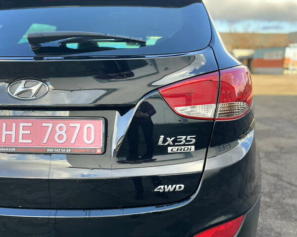 Чорний Хендай іх35, об'ємом двигуна 2 л та пробігом 225 тис. км за 12999 $, фото 15 на Automoto.ua