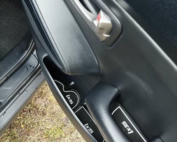 Черный Хендай их35, объемом двигателя 1.69 л и пробегом 250 тыс. км за 11888 $, фото 29 на Automoto.ua