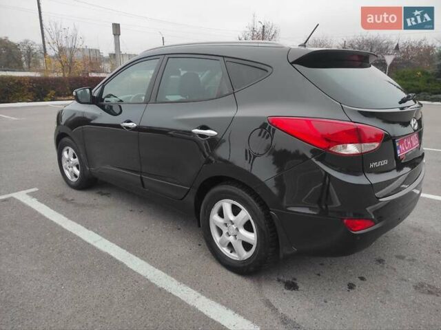 Черный Хендай их35, объемом двигателя 2 л и пробегом 249 тыс. км за 11900 $, фото 5 на Automoto.ua