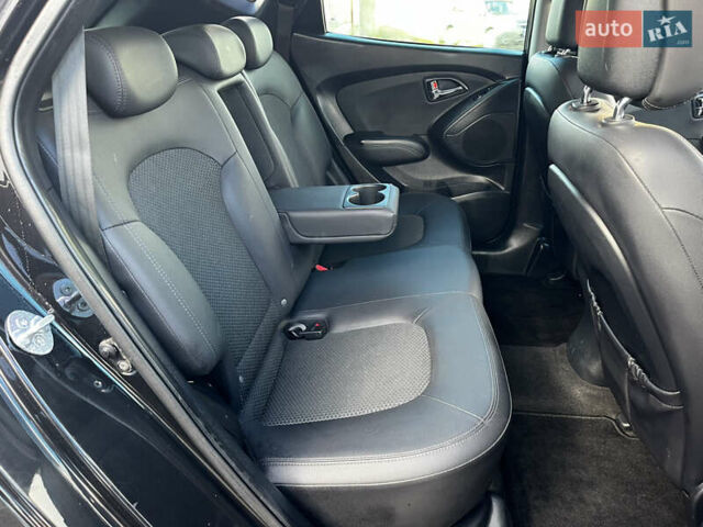 Чорний Хендай іх35, об'ємом двигуна 2 л та пробігом 225 тис. км за 12999 $, фото 32 на Automoto.ua