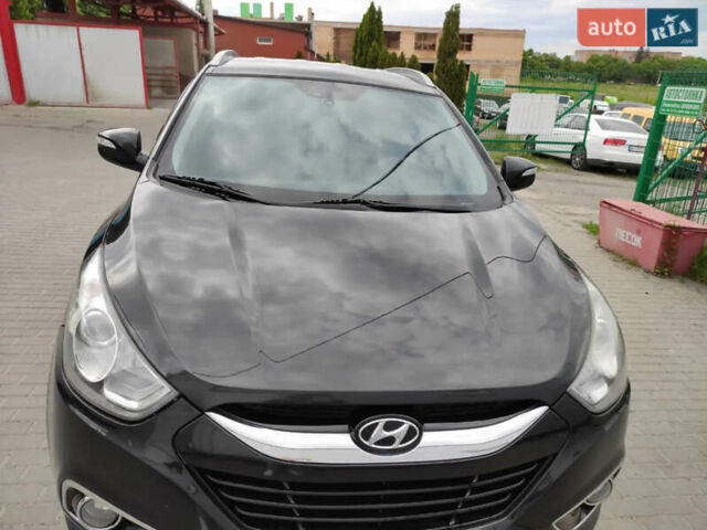 Черный Хендай их35, объемом двигателя 1.6 л и пробегом 295 тыс. км за 10500 $, фото 1 на Automoto.ua