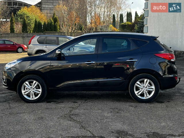 Чорний Хендай іх35, об'ємом двигуна 2 л та пробігом 225 тис. км за 12999 $, фото 7 на Automoto.ua