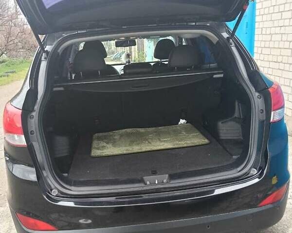 Черный Хендай их35, объемом двигателя 2 л и пробегом 190 тыс. км за 12800 $, фото 5 на Automoto.ua