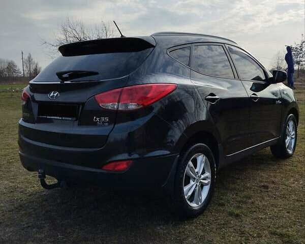 Черный Хендай их35, объемом двигателя 1.69 л и пробегом 250 тыс. км за 11888 $, фото 5 на Automoto.ua