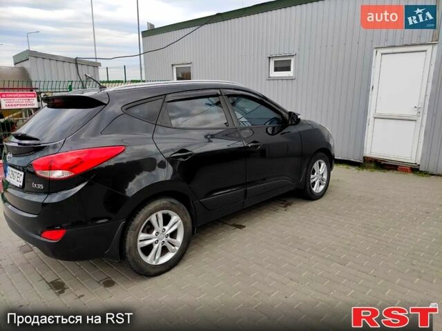 Черный Хендай их35, объемом двигателя 2 л и пробегом 290 тыс. км за 10500 $, фото 1 на Automoto.ua