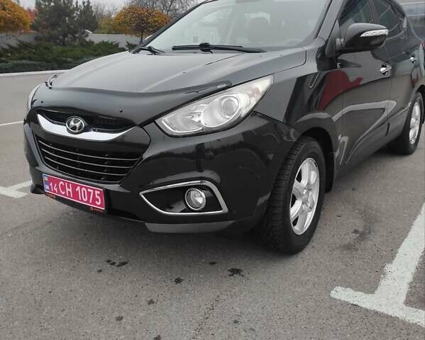 Черный Хендай их35, объемом двигателя 2 л и пробегом 249 тыс. км за 11900 $, фото 2 на Automoto.ua