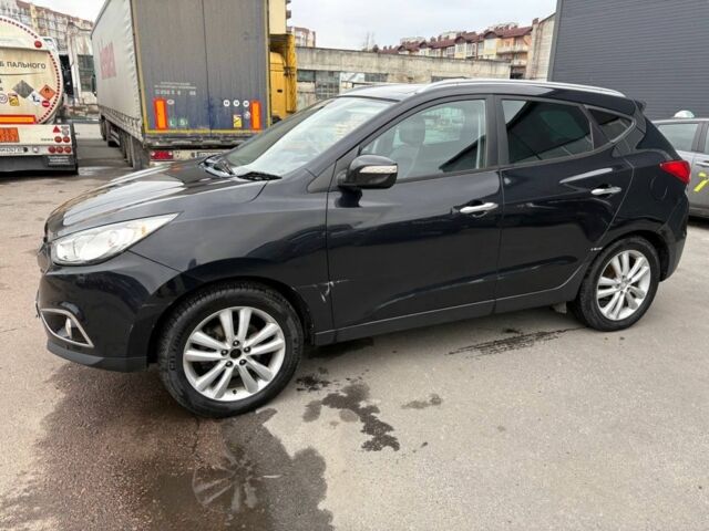 Чорний Хендай іх35, об'ємом двигуна 2 л та пробігом 141 тис. км за 4000 $, фото 4 на Automoto.ua