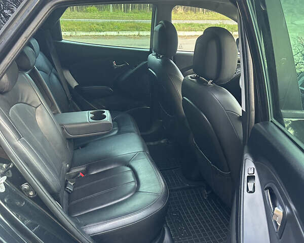 Чорний Хендай іх35, об'ємом двигуна 2 л та пробігом 240 тис. км за 12500 $, фото 13 на Automoto.ua