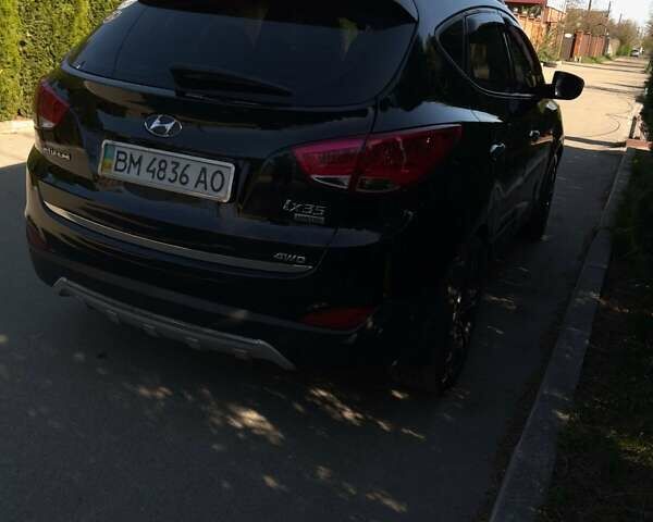 Чорний Хендай іх35, об'ємом двигуна 2.4 л та пробігом 213 тис. км за 12000 $, фото 4 на Automoto.ua