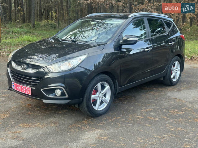 Черный Хендай их35, объемом двигателя 2 л и пробегом 240 тыс. км за 11900 $, фото 1 на Automoto.ua