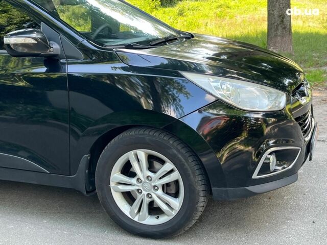 Чорний Хендай іх35, об'ємом двигуна 2 л та пробігом 195 тис. км за 13790 $, фото 11 на Automoto.ua