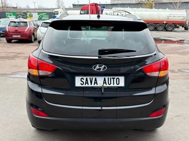 Чорний Хендай іх35, об'ємом двигуна 2 л та пробігом 141 тис. км за 4000 $, фото 5 на Automoto.ua