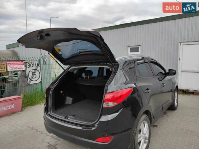 Черный Хендай их35, объемом двигателя 1.6 л и пробегом 295 тыс. км за 10500 $, фото 10 на Automoto.ua