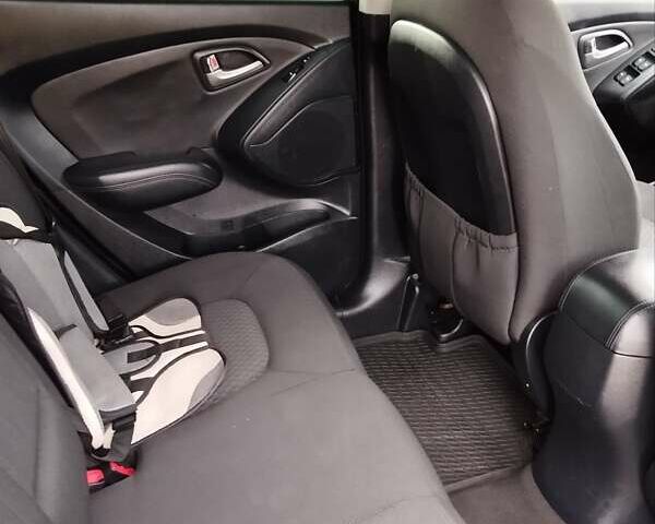 Черный Хендай их35, объемом двигателя 1.69 л и пробегом 250 тыс. км за 11888 $, фото 39 на Automoto.ua