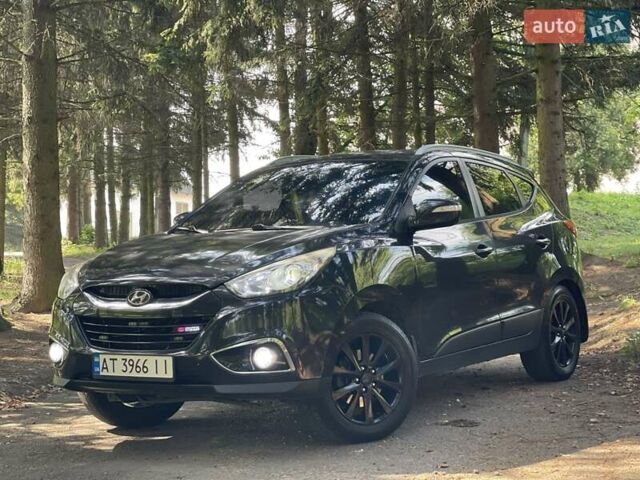 Чорний Хендай іх35, об'ємом двигуна 2 л та пробігом 287 тис. км за 10500 $, фото 12 на Automoto.ua