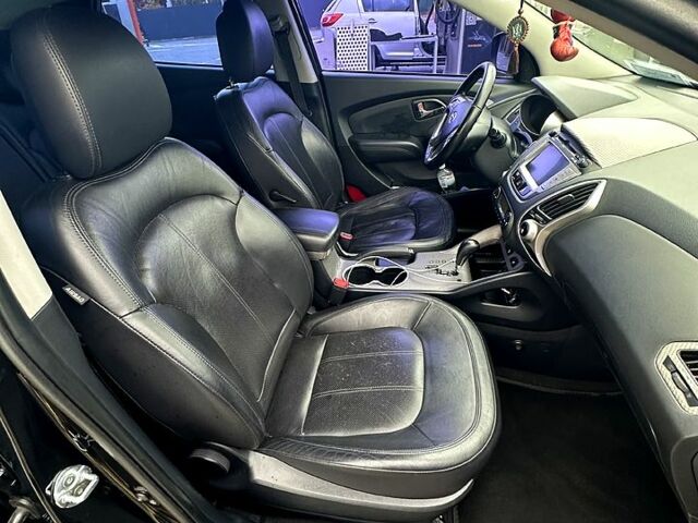 Чорний Хендай іх35, об'ємом двигуна 2 л та пробігом 116 тис. км за 10800 $, фото 12 на Automoto.ua