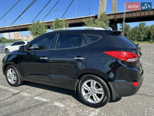 Чорний Хендай іх35, об'ємом двигуна 2 л та пробігом 196 тис. км за 12900 $, фото 5 на Automoto.ua