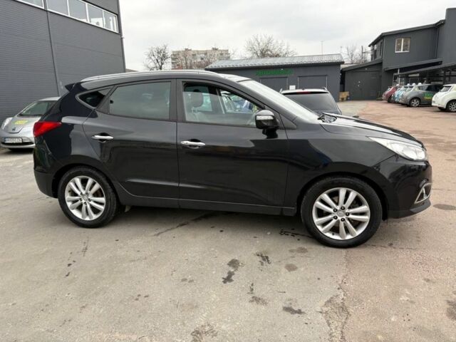 Чорний Хендай іх35, об'ємом двигуна 2 л та пробігом 141 тис. км за 4000 $, фото 3 на Automoto.ua