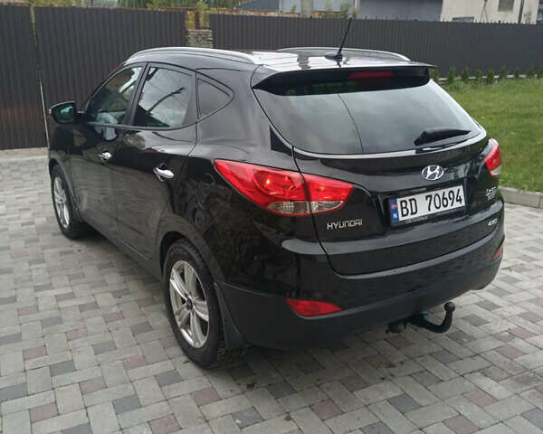 Черный Хендай их35, объемом двигателя 2 л и пробегом 111 тыс. км за 11900 $, фото 6 на Automoto.ua