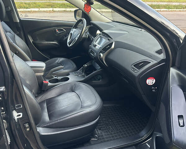 Чорний Хендай іх35, об'ємом двигуна 2 л та пробігом 240 тис. км за 12500 $, фото 15 на Automoto.ua