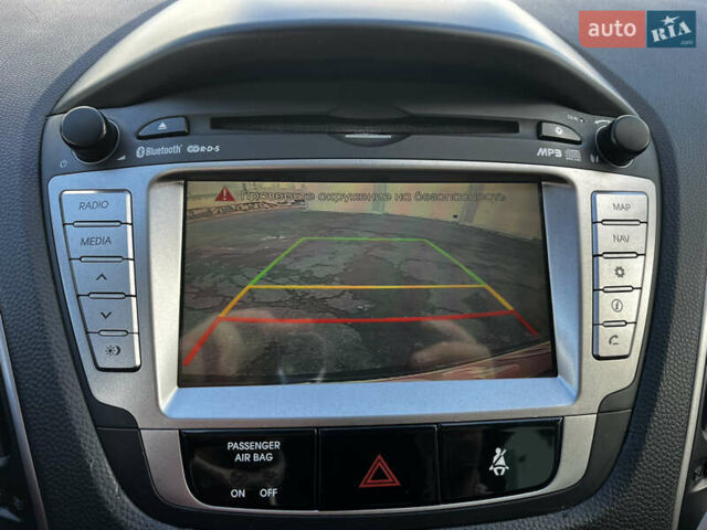 Чорний Хендай іх35, об'ємом двигуна 2 л та пробігом 226 тис. км за 12999 $, фото 28 на Automoto.ua