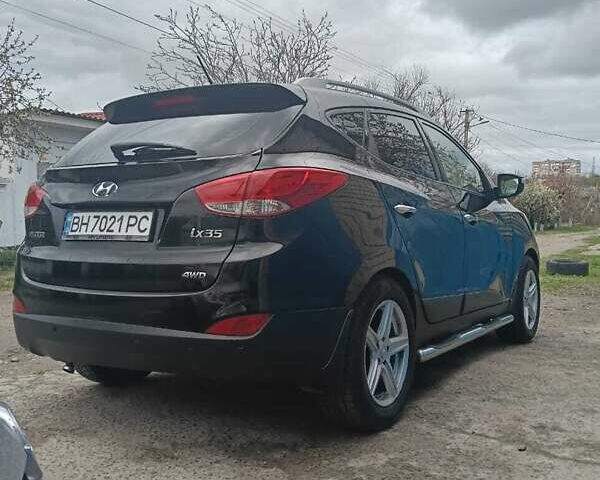 Черный Хендай их35, объемом двигателя 2 л и пробегом 190 тыс. км за 12800 $, фото 3 на Automoto.ua