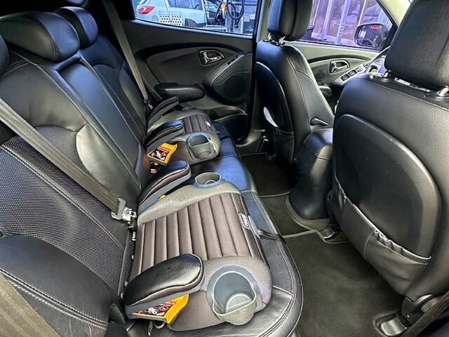 Чорний Хендай іх35, об'ємом двигуна 2 л та пробігом 116 тис. км за 10800 $, фото 10 на Automoto.ua