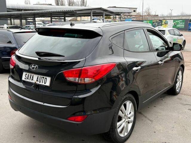 Чорний Хендай іх35, об'ємом двигуна 2 л та пробігом 141 тис. км за 4000 $, фото 7 на Automoto.ua