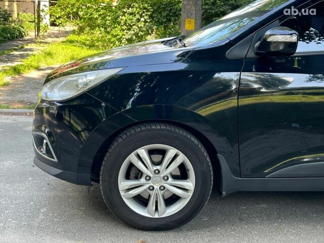 Чорний Хендай іх35, об'ємом двигуна 2 л та пробігом 195 тис. км за 13790 $, фото 3 на Automoto.ua