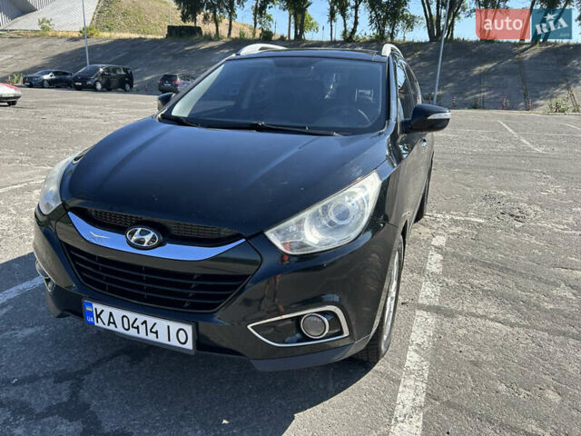 Чорний Хендай іх35, об'ємом двигуна 2 л та пробігом 196 тис. км за 12900 $, фото 4 на Automoto.ua