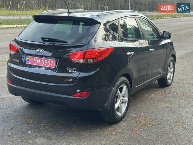 Чорний Хендай іх35, об'ємом двигуна 2 л та пробігом 240 тис. км за 12500 $, фото 8 на Automoto.ua