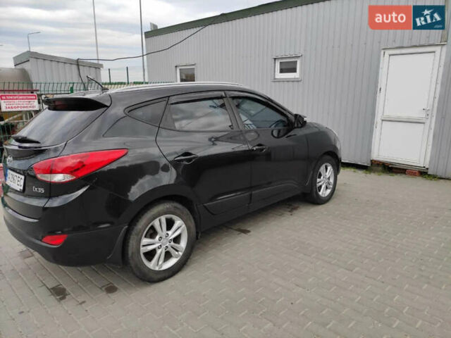 Черный Хендай их35, объемом двигателя 1.6 л и пробегом 295 тыс. км за 10500 $, фото 11 на Automoto.ua