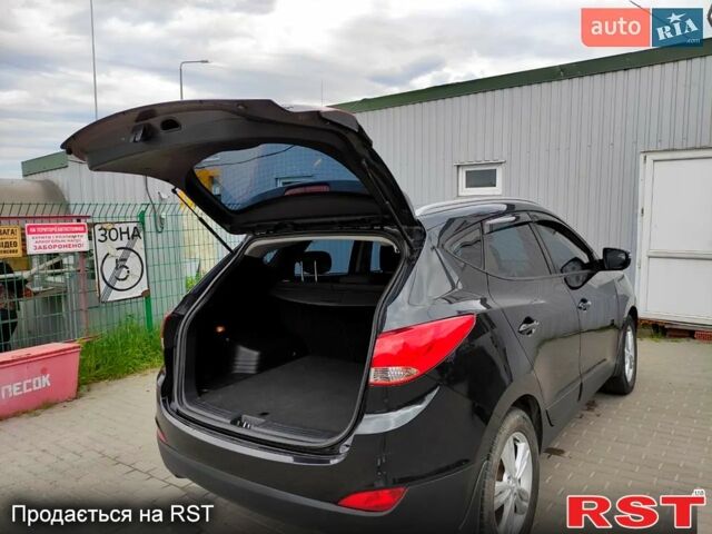 Черный Хендай их35, объемом двигателя 2 л и пробегом 290 тыс. км за 10500 $, фото 5 на Automoto.ua