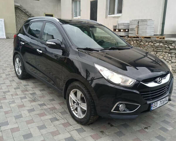 Черный Хендай их35, объемом двигателя 2 л и пробегом 111 тыс. км за 11900 $, фото 3 на Automoto.ua