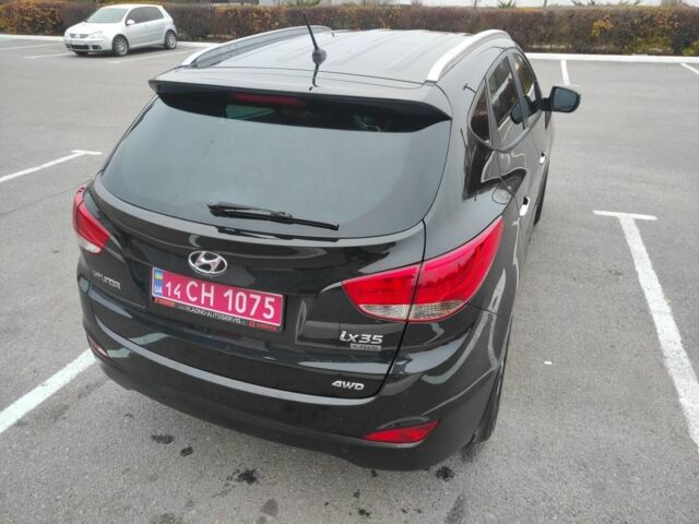 Черный Хендай их35, объемом двигателя 2 л и пробегом 249 тыс. км за 11900 $, фото 3 на Automoto.ua