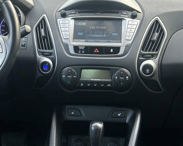 Чорний Хендай іх35, об'ємом двигуна 2 л та пробігом 240 тис. км за 12500 $, фото 17 на Automoto.ua