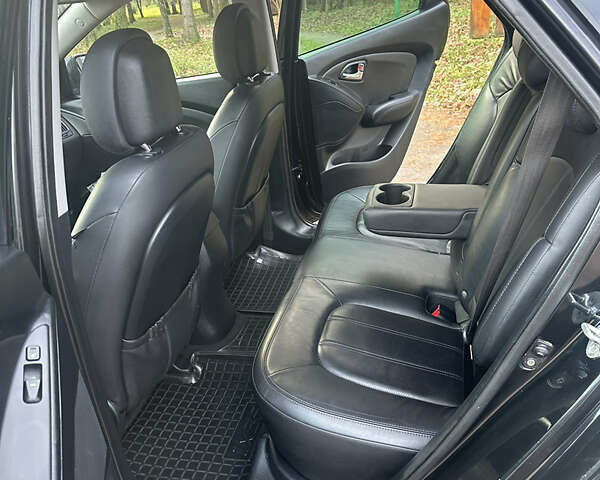 Черный Хендай их35, объемом двигателя 2 л и пробегом 240 тыс. км за 11900 $, фото 12 на Automoto.ua