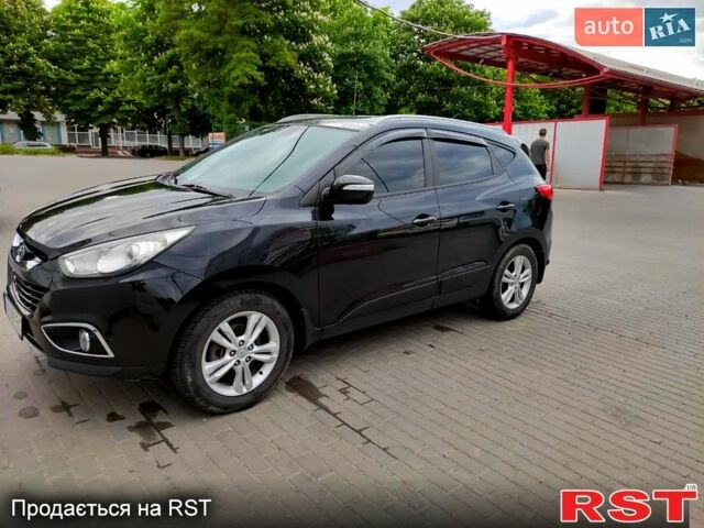 Черный Хендай их35, объемом двигателя 2 л и пробегом 290 тыс. км за 10500 $, фото 12 на Automoto.ua