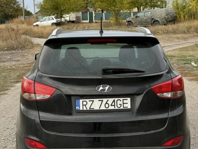 Чорний Хендай іх35, об'ємом двигуна 2 л та пробігом 237 тис. км за 7100 $, фото 4 на Automoto.ua