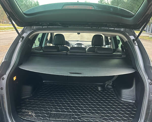 Чорний Хендай іх35, об'ємом двигуна 2 л та пробігом 240 тис. км за 12500 $, фото 14 на Automoto.ua