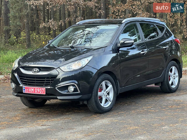 Чорний Хендай іх35, об'ємом двигуна 2 л та пробігом 240 тис. км за 12500 $, фото 4 на Automoto.ua