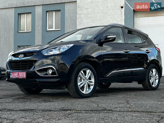 Чорний Хендай іх35, об'ємом двигуна 2 л та пробігом 225 тис. км за 12999 $, фото 8 на Automoto.ua